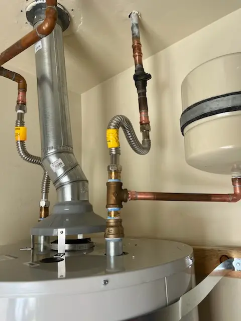 Water heater installation and plumbing repair in Hampden